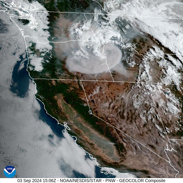 Tuesday morning’s satellite shows areas an area of low pressure moving across the Northern Rockies, with heavy smoke over Idaho and Oregon.